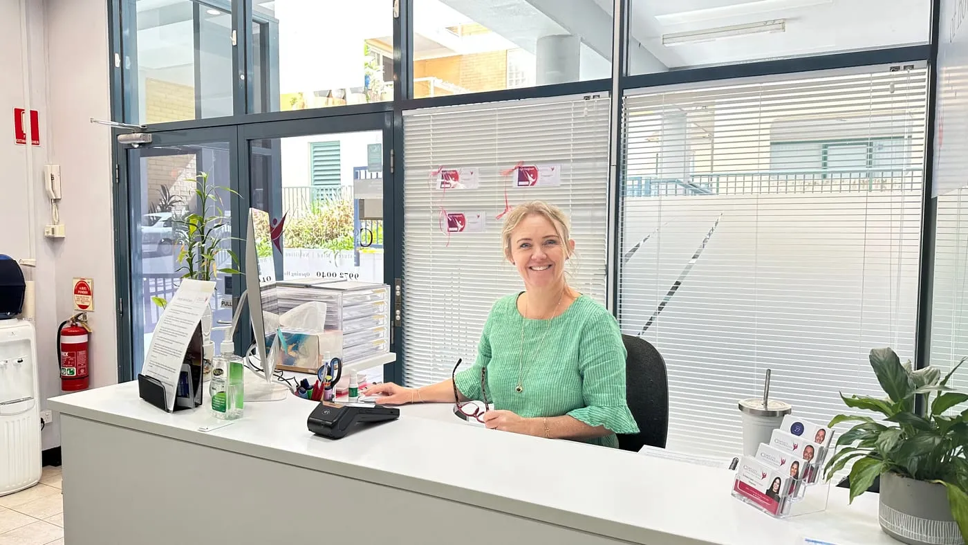 Emma, our Chiropractic Assistant, at the Complete Chiropractic Dee Why front desk