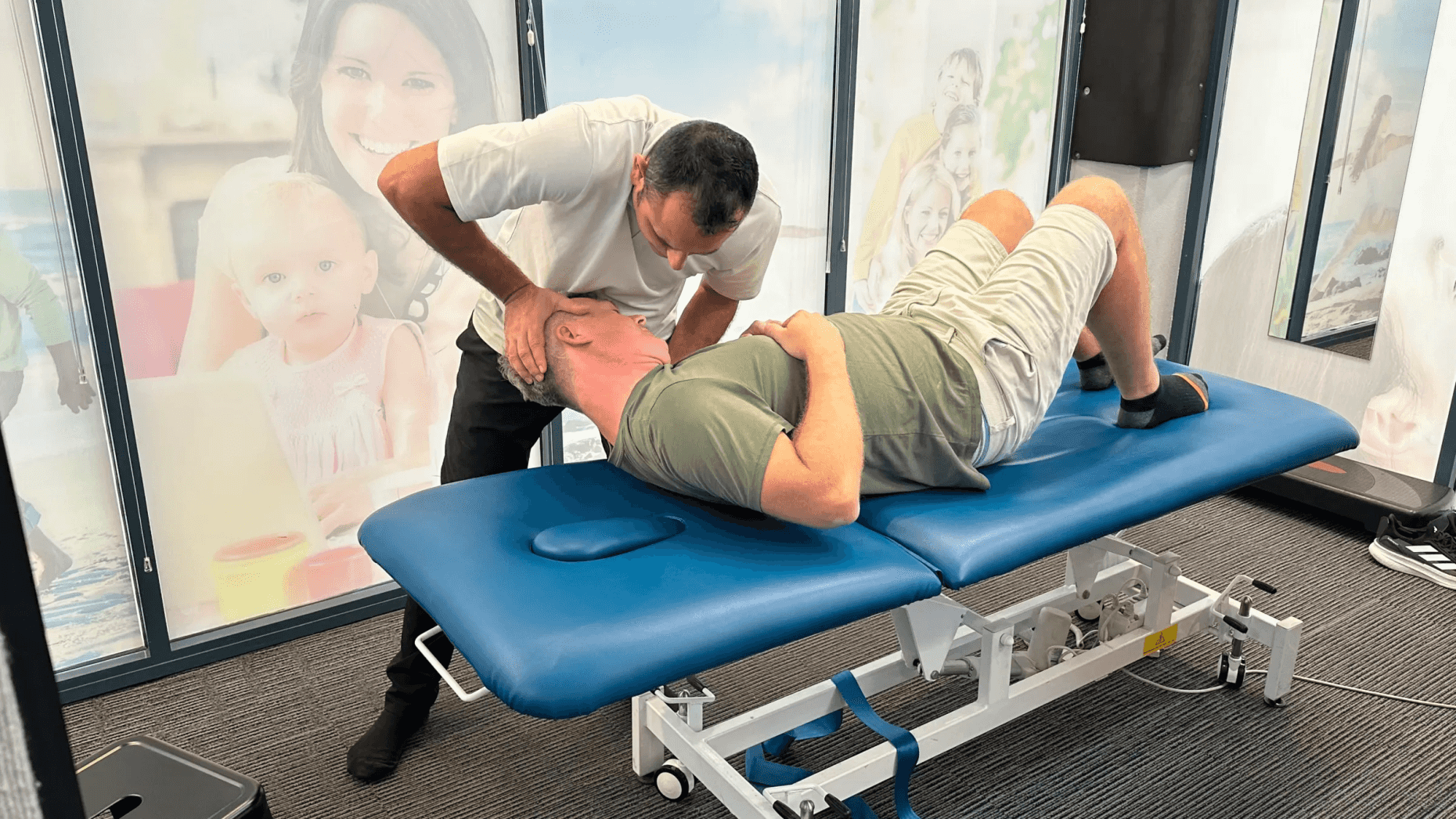 Chiropractor performing adjustment on patient at Complete Chiropractic Dee Why